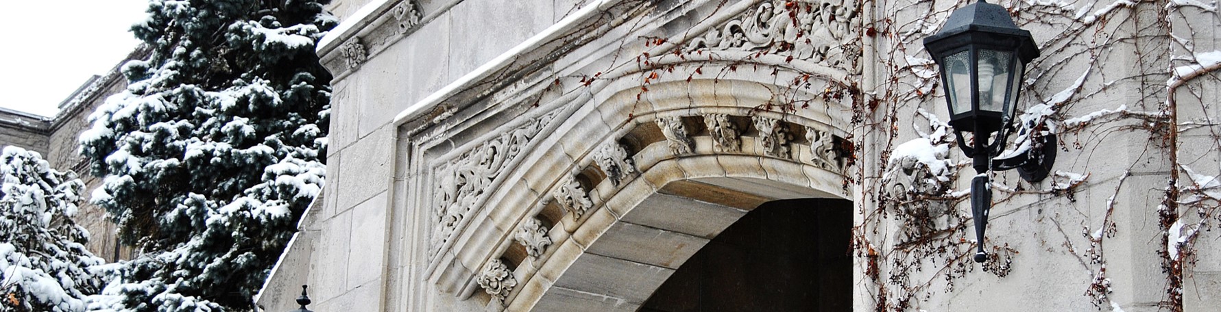 Arch way entrance in the snow at University of Guelph